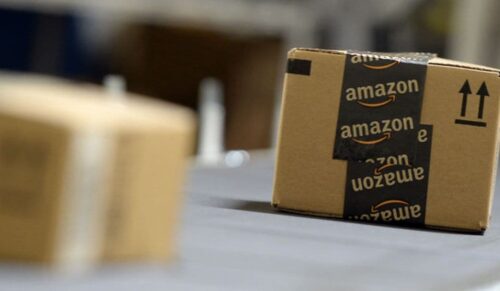 SAN BERNARDINO, OCTOBER 29: Shipping orders go by on a conveyor belt at Amazon's San Bernardino Fulfillment Center October 29, 2013 in San Bernardino, California. Amazon's 1 million square-foot facility in the hard hit San Bernardino County has created more than 800 jobs at the center. Fulfillment centers are where products sold by other vendors on Amazon.com store their inventory. (Photo by Kevork Djansezian/Getty Images)