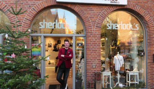 Eugene Schulte und der Sherlocks-Store. (Foto: Sherlocks)