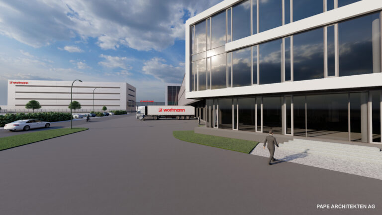 Visualisierung des neuen Logistik-Komplexes der Wortmann KG: rechts das Paletten-Hochregallager, hinten links das neue Shuttle-Lager. Die Gebäude werden über eine Brücke mit Förderbändern verbunden. (Visualisierung: Wortmann KG)